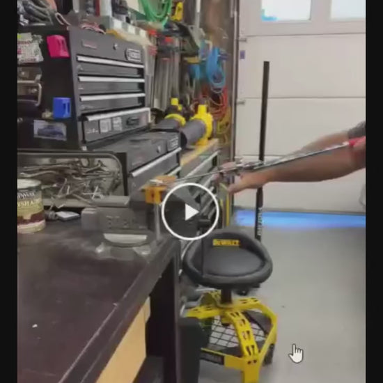 Wrench extender bar loosening a stubborn bolt